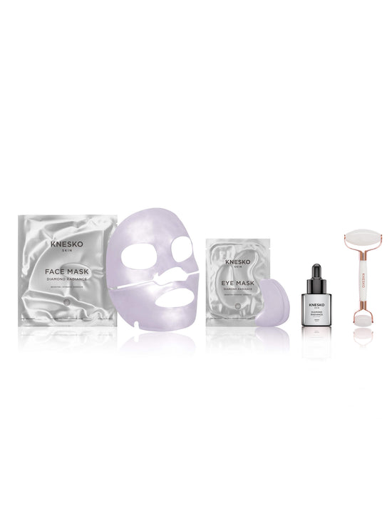 Kiehl's skincare products including face mask, eye mask, serum, and roller on a white background