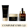 Knesko skincare products including cleanser, cream, and face oil on a white background with 'Complimentary Gift' text.