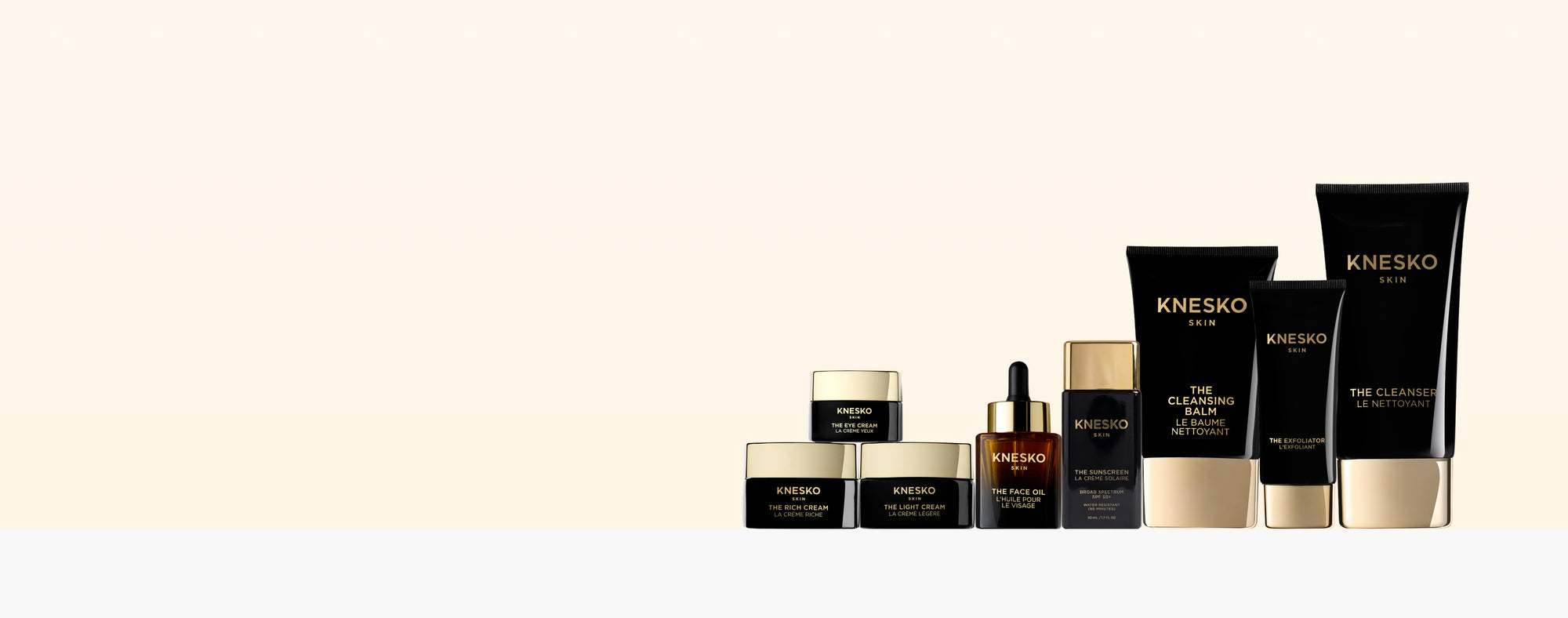 Knesko skincare products on a beige background
