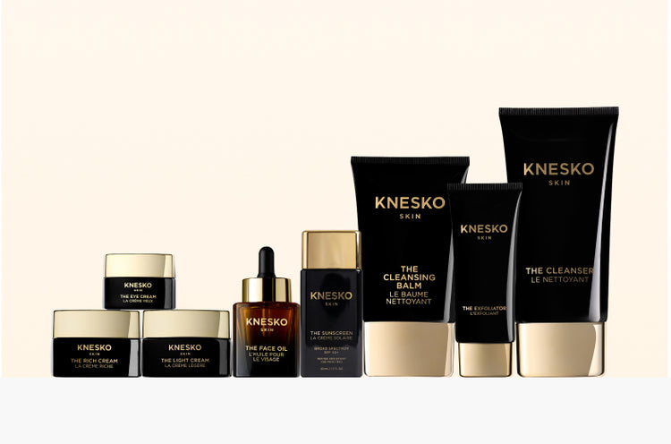 Knesko skincare products on a beige background