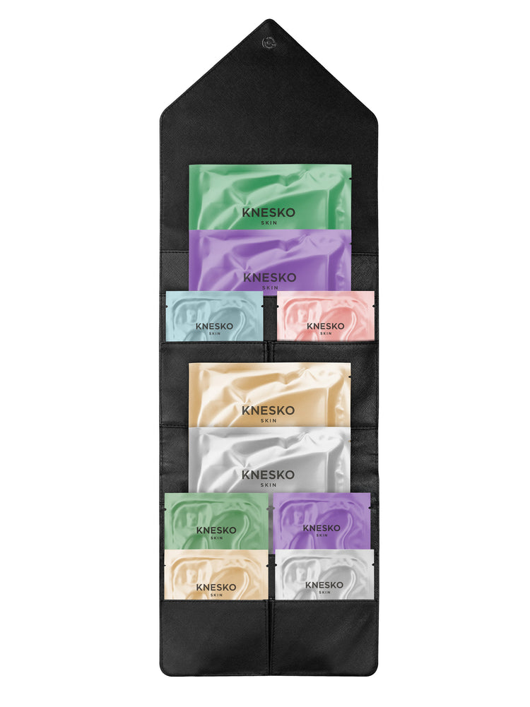 Set of Knesko skincare samples in a black holder on a white background