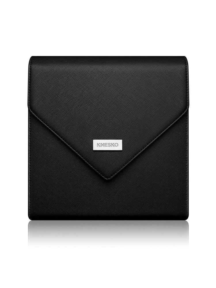 Black envelope-style clutch bag with 'KNESKO' branding on a white background